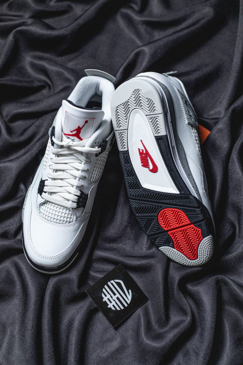 Flat lay showing full outsole and red hits
