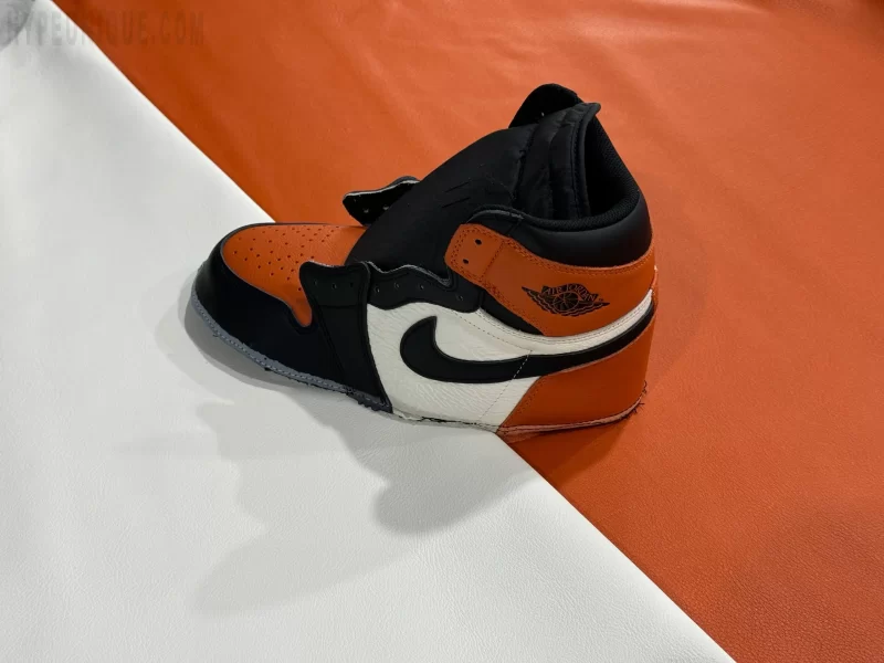 Tongue and label detail on Air Jordan 1 Shattered Backboard reps