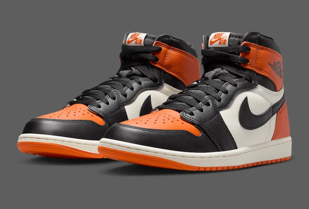Side view of Jordan 1 Shattered Backboard Reps 2025 in black, sail, and starfish orange