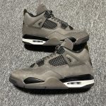 Street style images with the "Cave Stone" Jordan 4