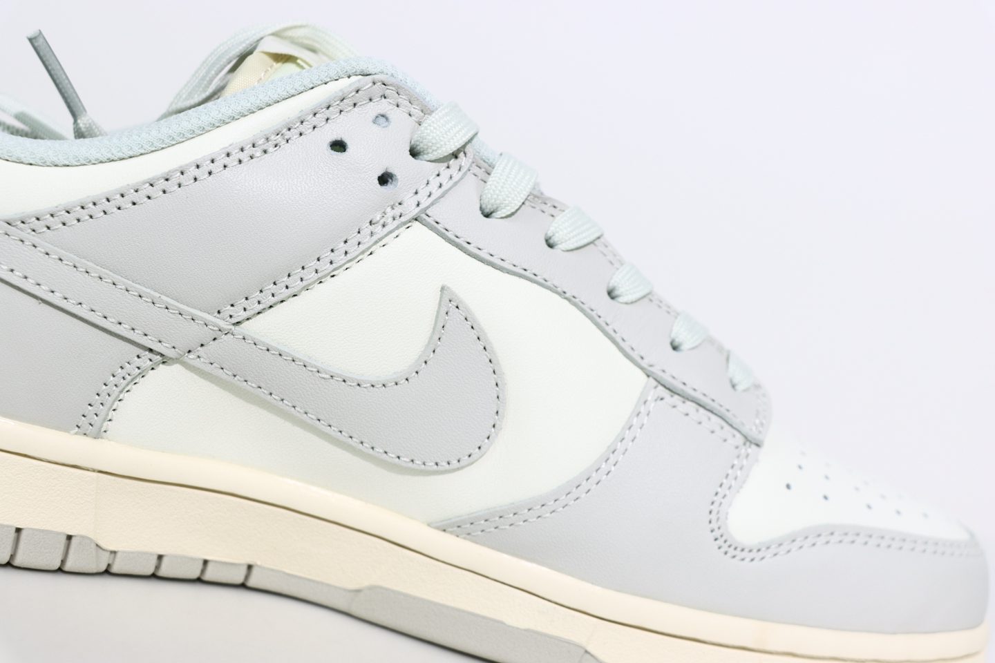 grey and white dunks