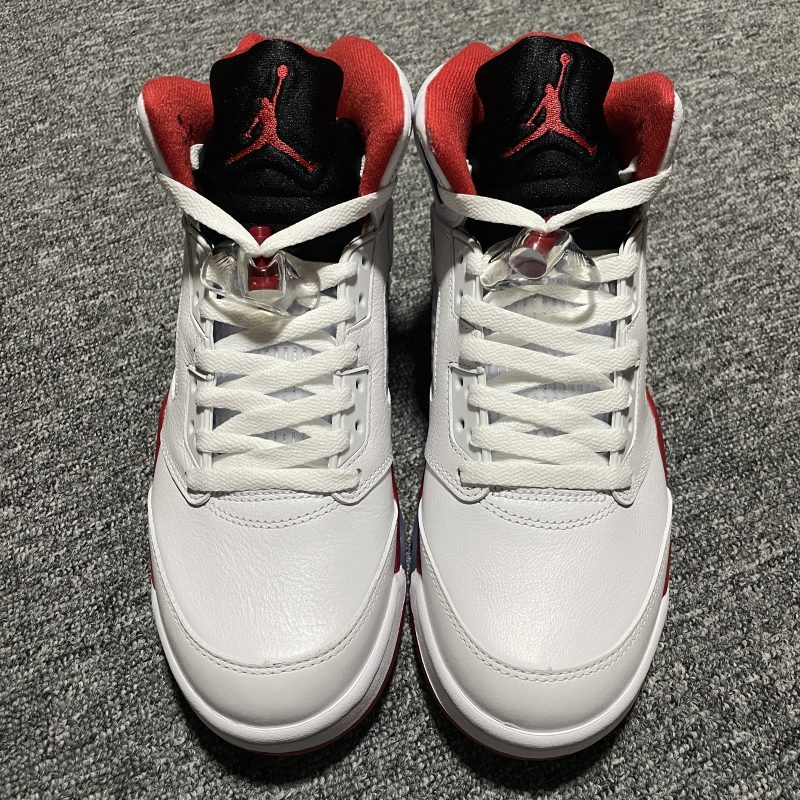 Air Jordan 5 Fire Red Black Tongue close-up with Jumpman logo