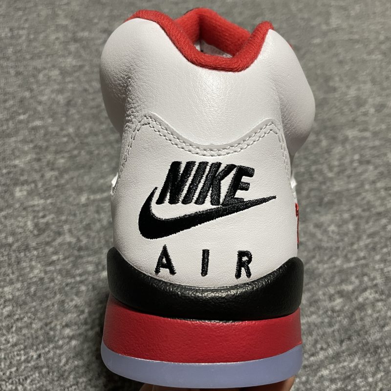 Close-up of Air Jordan 5 Fire Red Black Tongue leather and mesh details