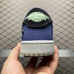 Close-up of Voodoo stitching and branding on Jordan 1 Low Zion Williamson