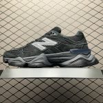 Side view of New Balance 9060 Triple Black sneakers showcasing signature N logo and design