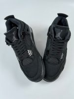 Front view Air Jordan 4 Black Cat 2025, laces, tongue, Jumpman logo FV5029-010