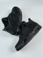 Rear view Jordan 4 Retro Black Cat 2025, heel tab, Jumpman branding FV5029-010
