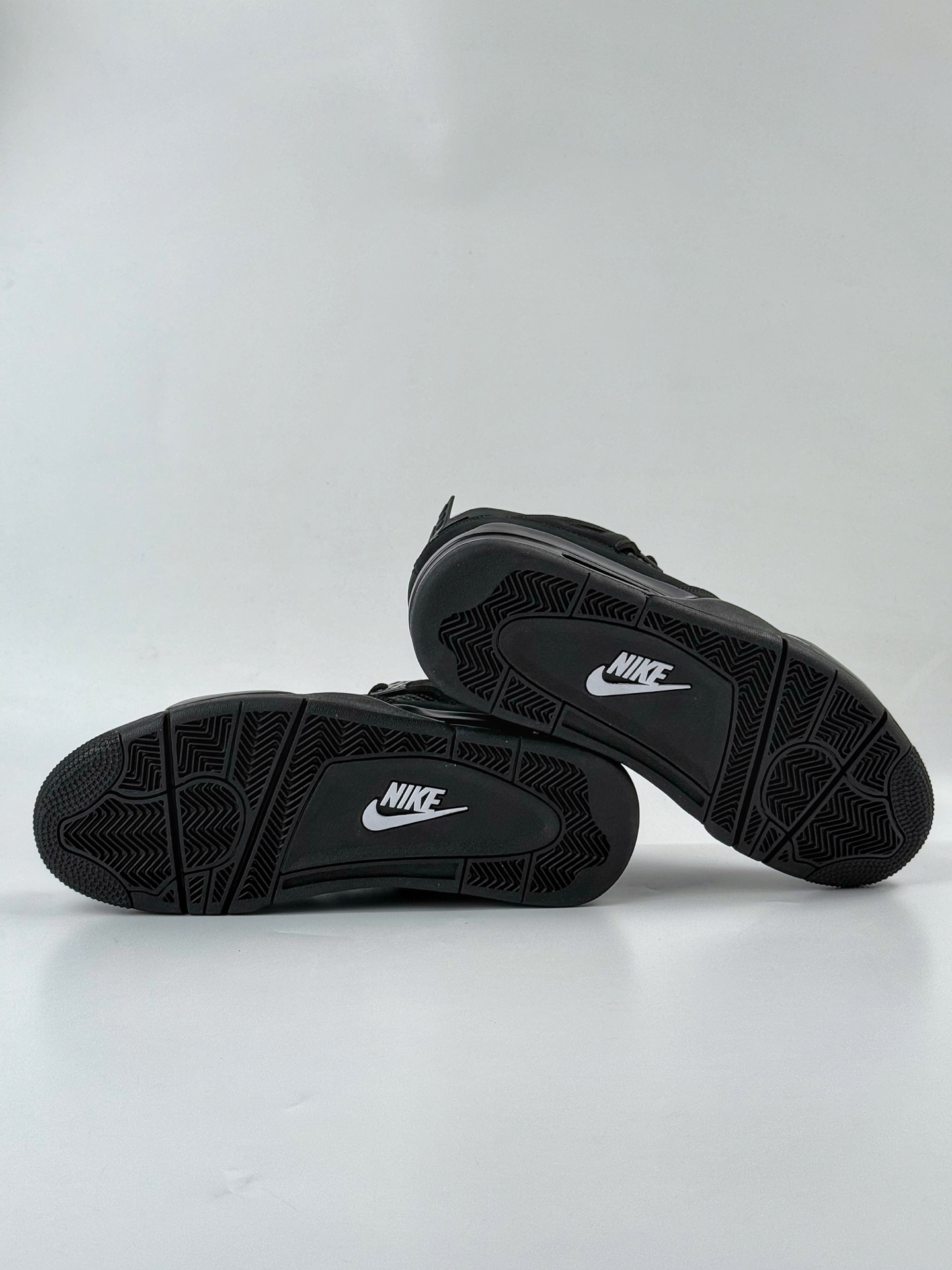 Jordan 4 Retro Black Cat (2025) 2 Jordan 4 Retro Black Cat 2025 on foot, lifestyle wear, sneaker style FV5029-010