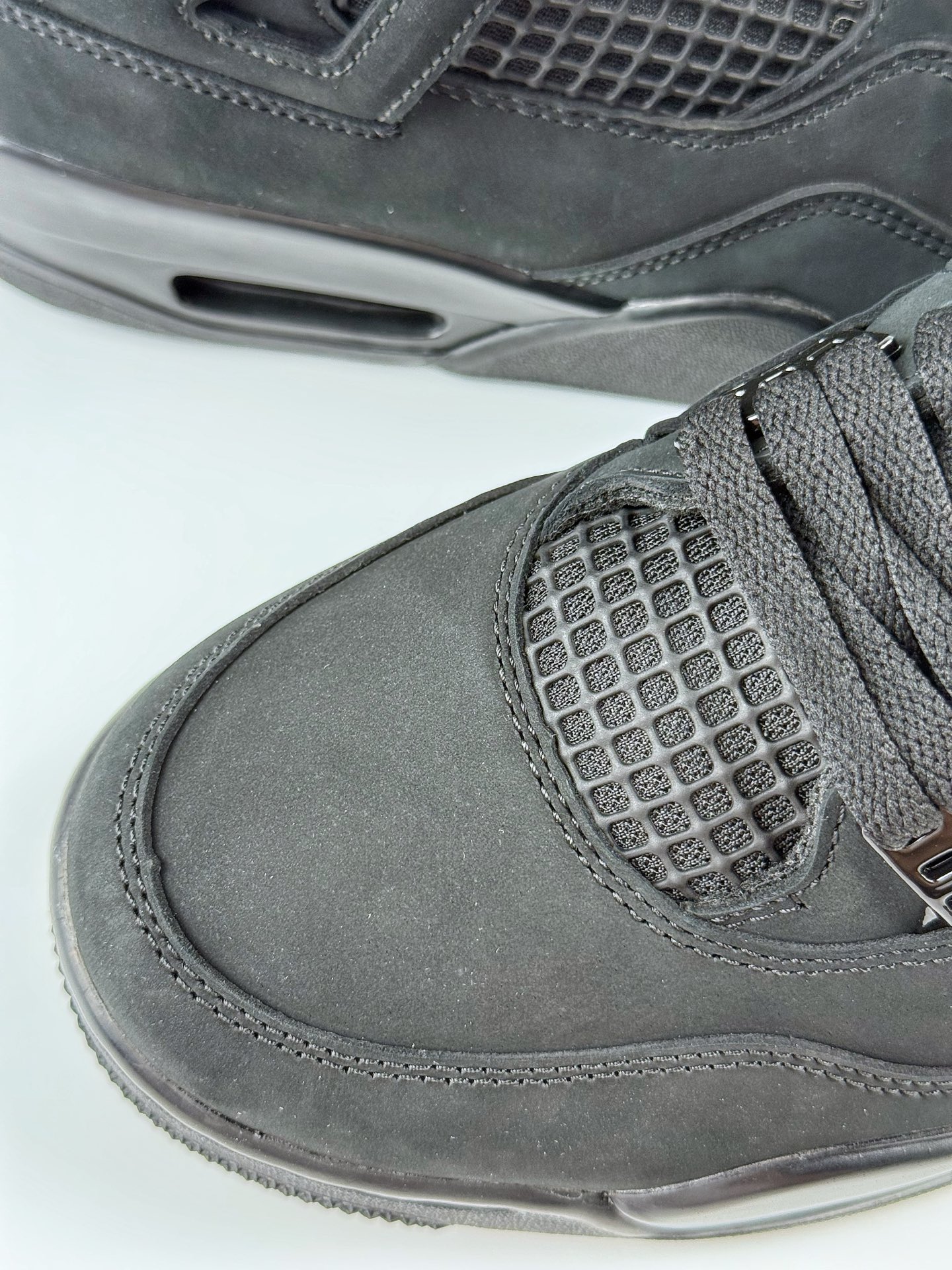 Jordan 4 Retro Black Cat (2025) 4 Jordan 4 Retro Black Cat 2025 collection, rare sneakers, sneakerhead essential FV5029-010