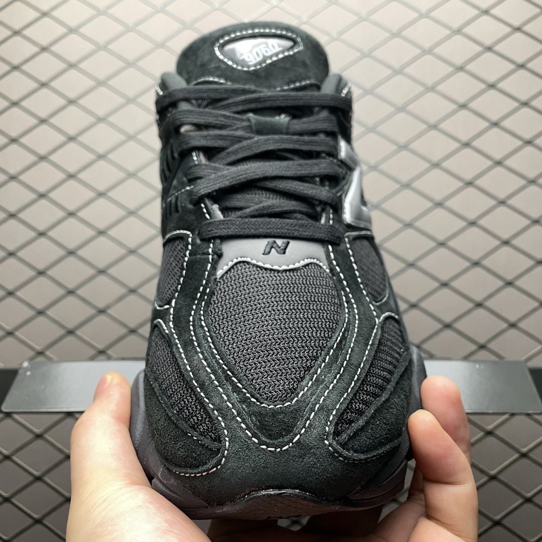 New Balance 9060 Triple Black sneakers U9060BPM in a studio shot, highlighting silhouette