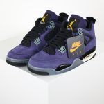 Rear view of Jordan 4 Retro Lakers FV5029-500, highlighting Jumpman logo on heel and overall silhouette