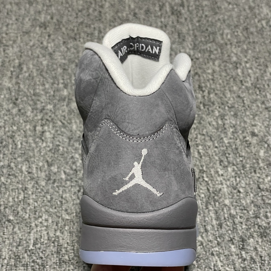 Jordan 5 Retro Wolf Grey (2026) 4 Lifestyle shot of Jordan 5 Retro Wolf Grey 2026 sneakers DD0587-002