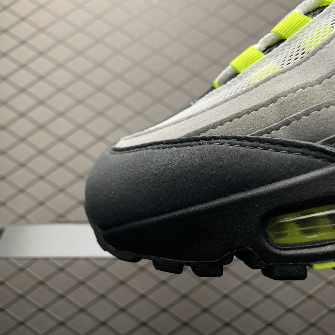 Nike Air Max 95 OG Big Bubble Neon (2025/2026) 2 On-foot shot of Nike Air Max 95 OG Big Bubble Neon (2025/2026) sneakers worn by a person, casual lifestyle setting, showing fit and style