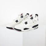 Side profile of Jordan 4 Retro OG Flight Club sneaker with netting