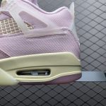 Bottom sole of Jordan 4 Retro Iced Carmine IB6716-600, black and white rubber outsole