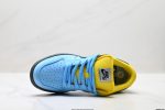 Vibrant turquoise accents on Nike SB Dunk Low Pro sneakers