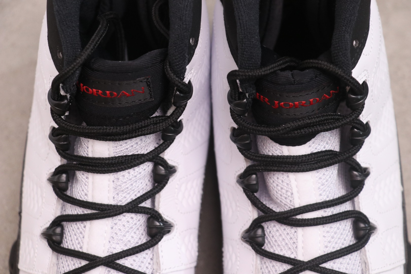 Jordan 9 Retro OG Space Jam (2026) 8 Jordan 9 Retro OG Space Jam (2026) tongue branding and lacing system, IX6179-100